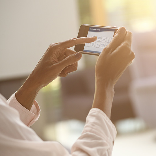 close up of hands using a smartphone
